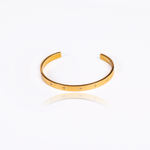 This is a great go-to accessory to have to complete your party outfit or your casual look! Pick this up now and never worry about matching jewelry again! An elegant accessory to be worn alone or stacked with other bracelets.  18K gold plated on stainless steel. Width: 2.4"