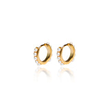 Oh, baby! We love our BABY HUGGIES. Similar to our OWN HOOP EARRINGS, these huggies feature small pearls on the sides of the hoop. Layer with these babies and call it a day!  18k gold plated on 925 sterling silver. Outer diameter: 10.9mm  All the earrings come in a beautiful jewelry pouch.