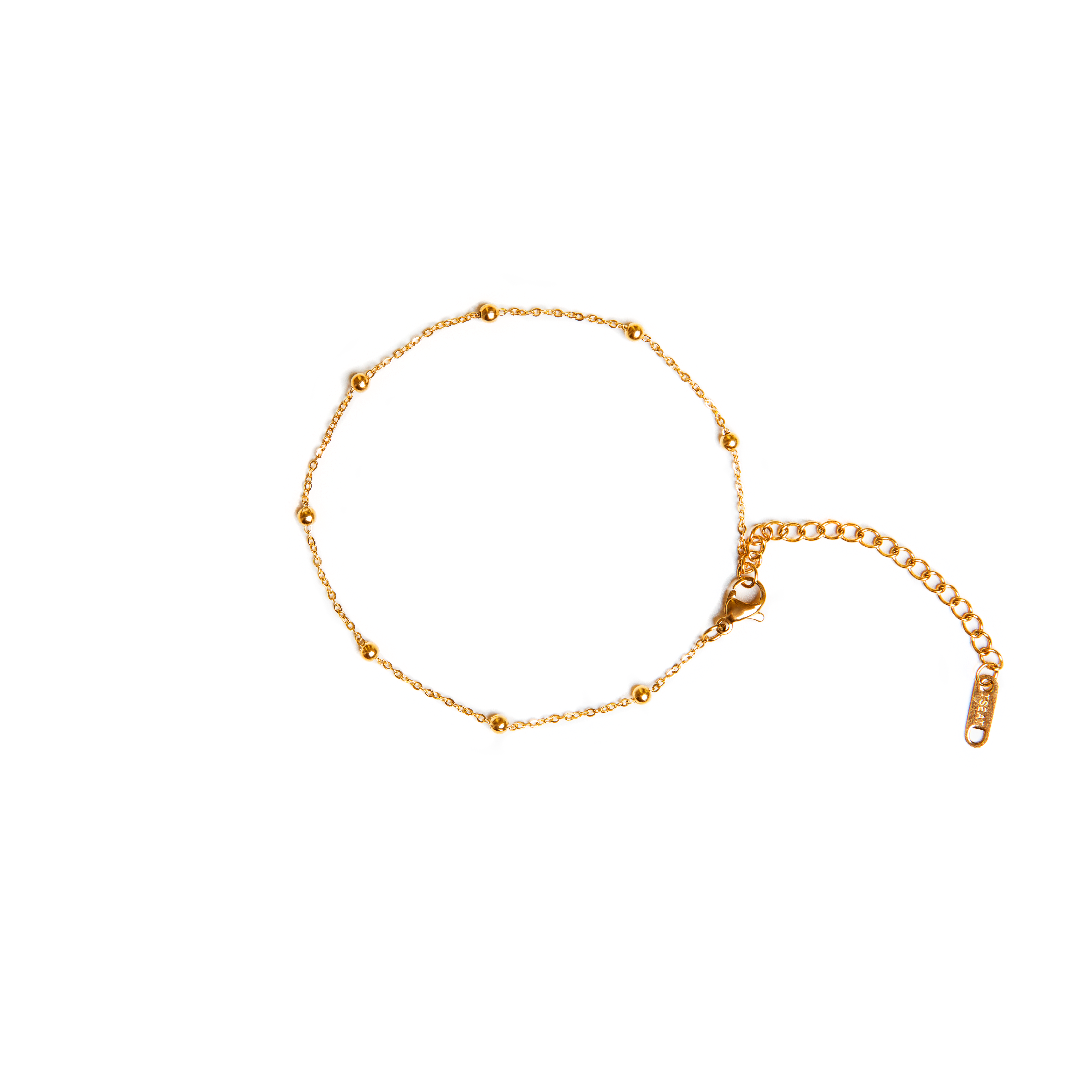 Featuring small gold beads, this anklet makes for the  perfect layering piece, or is just as cute on its own. Pair it with your favorite sandals, heels, or sneakers.    18k gold plated on stainless steel. Length: 8” Extender: 2”