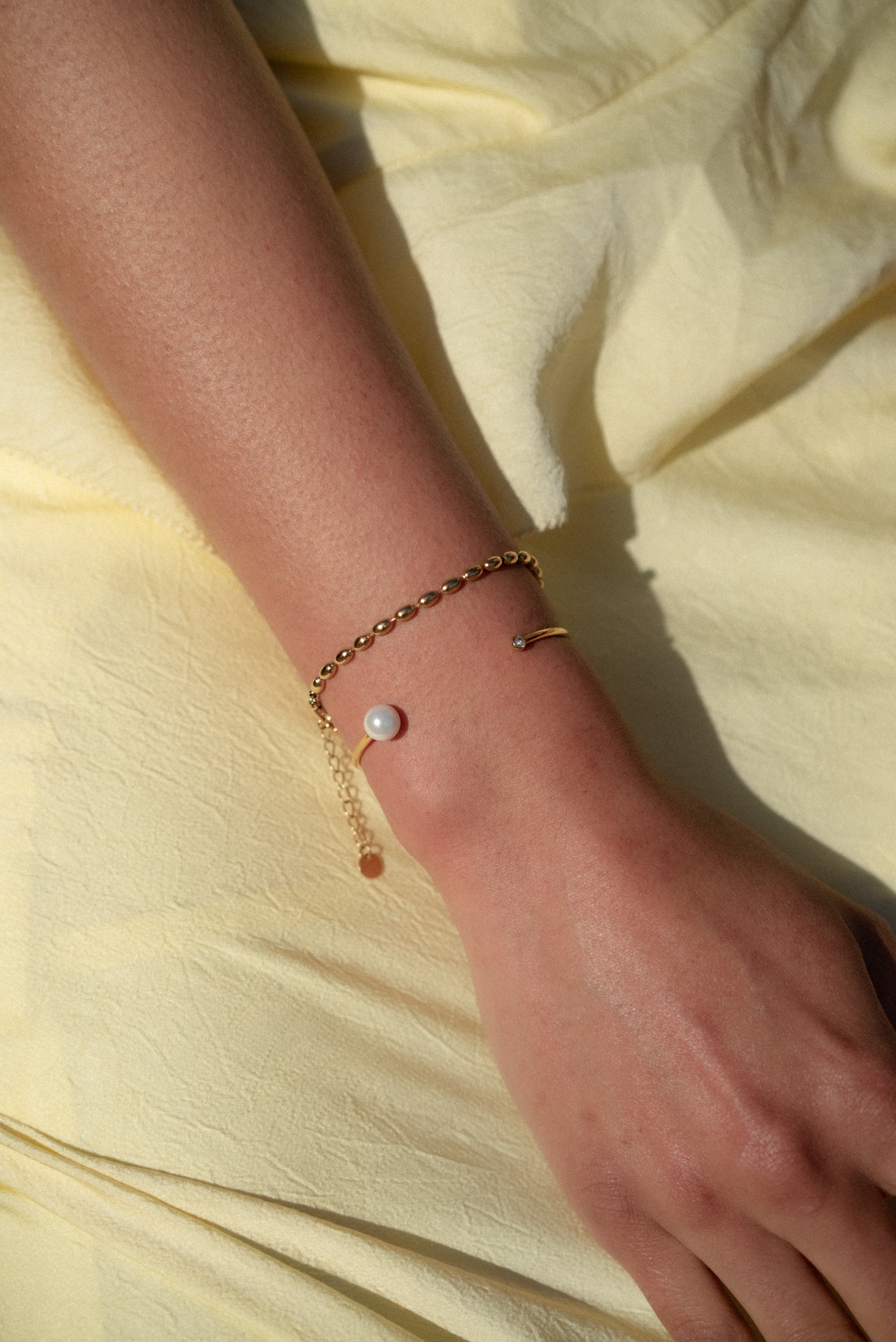 Make a striking statement with our exquisite Cuff Bracelet, designed to adorn your wrist with a captivating fusion of modernity and timeless charm.  18K gold plated on stainless steel. All the bracelets come in a beautiful jewelry pouch.