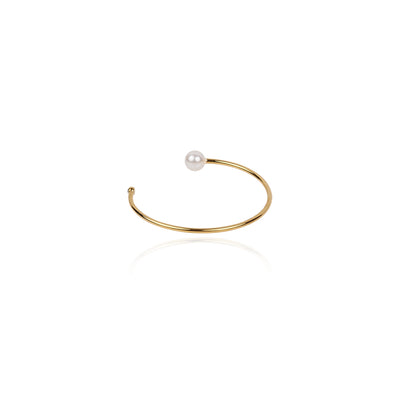 Make a striking statement with our exquisite Cuff Bracelet, designed to adorn your wrist with a captivating fusion of modernity and timeless charm.  18K gold plated on stainless steel. All the bracelets come in a beautiful jewelry pouch.