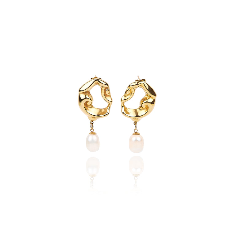 Searching for a special gift that symbolizes elegance and refinement? Look no further than our Pearl Drop Earrings. Whether for a loved one or a treasured friend, these earrings make a thoughtful and cherished gift. Delivered in an elegant gift box, they are ready to make a lasting impression.  18k gold plated on stainless steel. All the earrings come in a beautiful jewelry pouch.