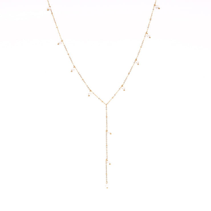 The lariat-style chain of this necklace adds a contemporary and trendy twist to the traditional pearl necklace. The adjustable length allows for versatile styling options, whether you prefer a long and dramatic look or a layered and more delicate appearance. The lariat design makes this necklace a versatile piece that can be worn with various necklines and outfits.  18k gold plated on stainless steel. All the necklaces come in a beautiful jewelry box.