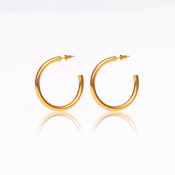 This pair of hoop earrings is the perfect piece to add a classy touch to any outfit. They&