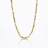 The twisted pattern gives you a signature look.  18K gold plated on stainless steel. Length: 16" Extender: 2"
