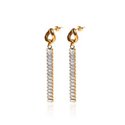 Our HONEY EARRINGS are the sweetest addition to our FW2022/23 collection. These dangly earrings featuring cubic zirconia (CZ) stones can dress up a casual look or elevate your more glam night out look.  18k gold plated on stainless steel.  Length: 2.7" All the earrings come in a beautiful jewelry pouch.