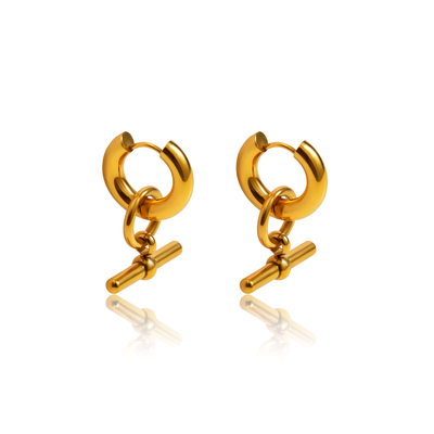 Create elegant style to match every outfit with these hoops. Featuring a unique design, you can also remove the dangle part & wear with or without a very versatile piece.  18k gold plated on stainless steel. Hoop size: 18*25mm 