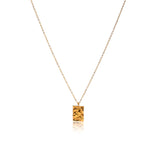 A simple, minimalistic necklace design. Its delicate chain and unique pendant make this the perfect piece for everyday wear.  18K gold plated on stainless steel. Length: 41CM Extender: 5CM This product is hypoallergenic and tarnish resistant.   