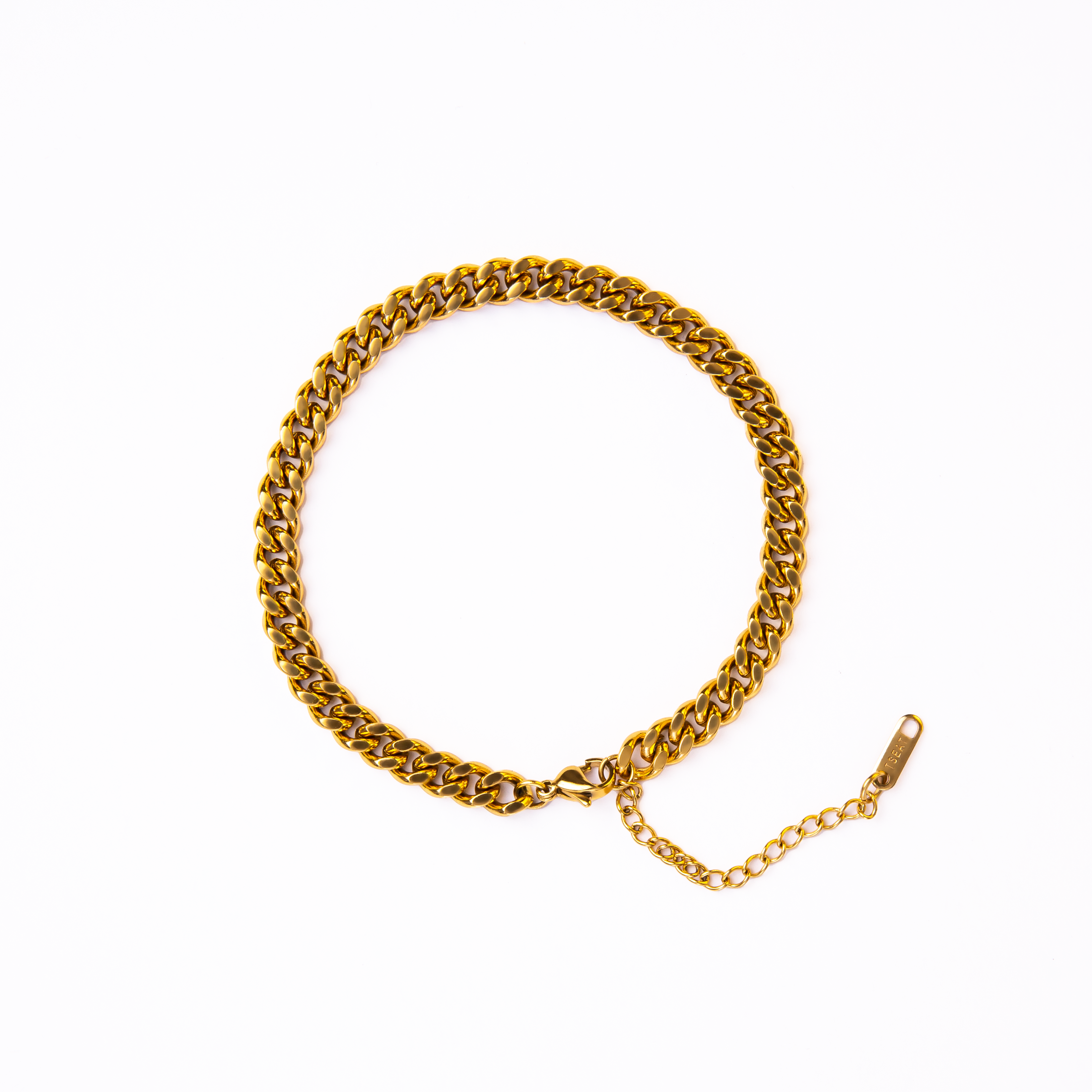 Parisian fashion has always been inspired by the runway. Our latest collection is no exception. We designed this layering anklet with our medium chain, to make a sweet and delicate accent on your Parisian look.  18k gold plated on stainless steel. Length: 20 CM Extender: 5CM This product is hypoallergenic and tarnish resistant. 