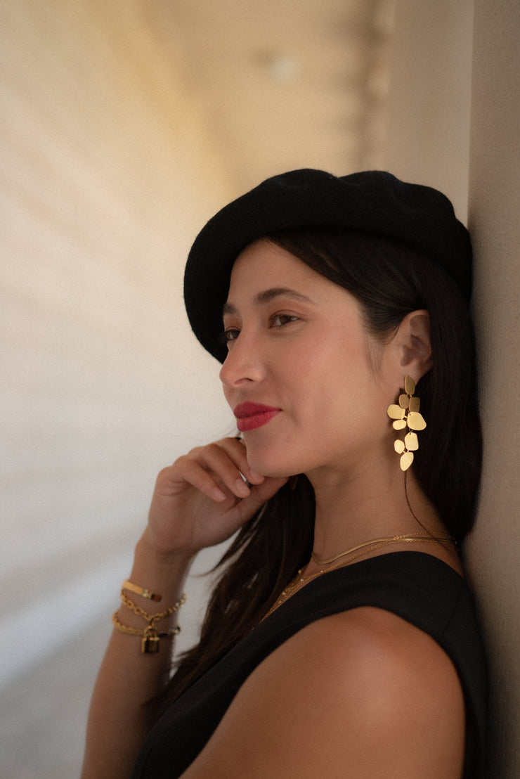 Meet our LEAF EARRINGS. These beauties feature a leaf-like design and will be your favorite statement piece. If you love fun, bold earrings this is just the accessory for you!  18k gold plated on stainless steel. Length: 2.8"  All the earrings come in a beautiful jewelry pouch.