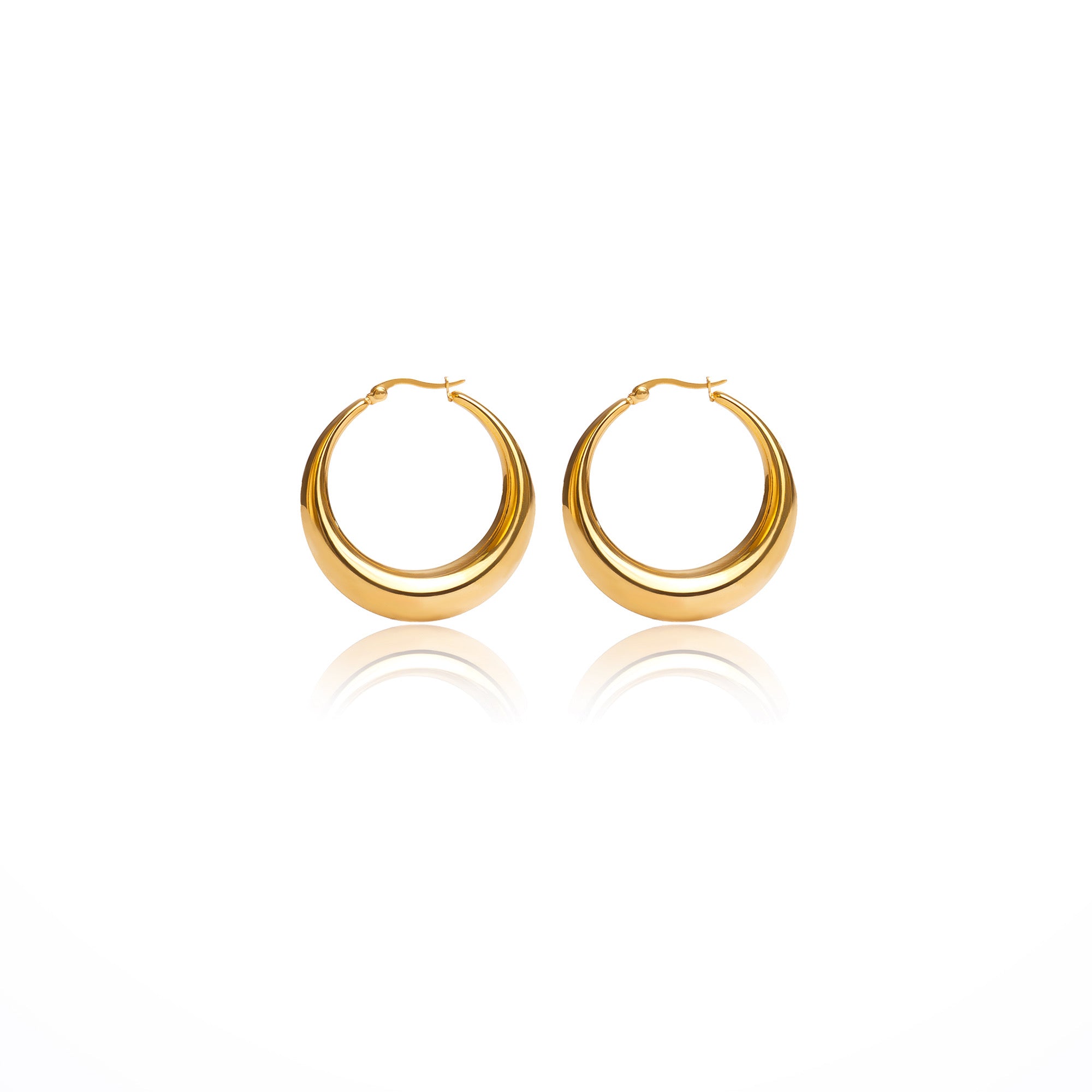 These are the sand hoop earrings you've been looking for! Big, chunky and bold - this pair of hoop earrings are perfect for every day wear. Also you can pair it with our Berri hoop earrings to create that bold look.  18k gold plated on stainless steel. Height 4CM This product is hypoallergenic and tarnish resistant.