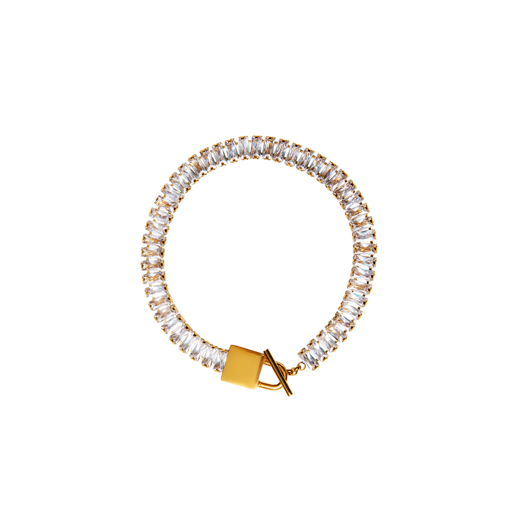 A must-have for any collection, this gold bracelet will add a touch of contemporary style to any look. Perfect for adding an effortless edge to any outfit.