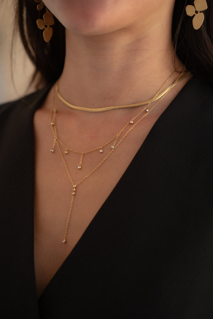 Our SIMPLE LARIAT NECKLACE was made for all you necklace stack lovers. It&