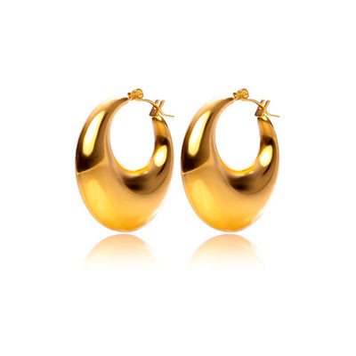 Gold hoop earrings are the essence of effortless chic. Perfect for special nights out, these gold hoop earrings will bring a touch of modern design. Pair them with elegant from day to night.  18k gold plated on stainless steel. Height 3CM This product is hypoallergenic and tarnish resistant. 